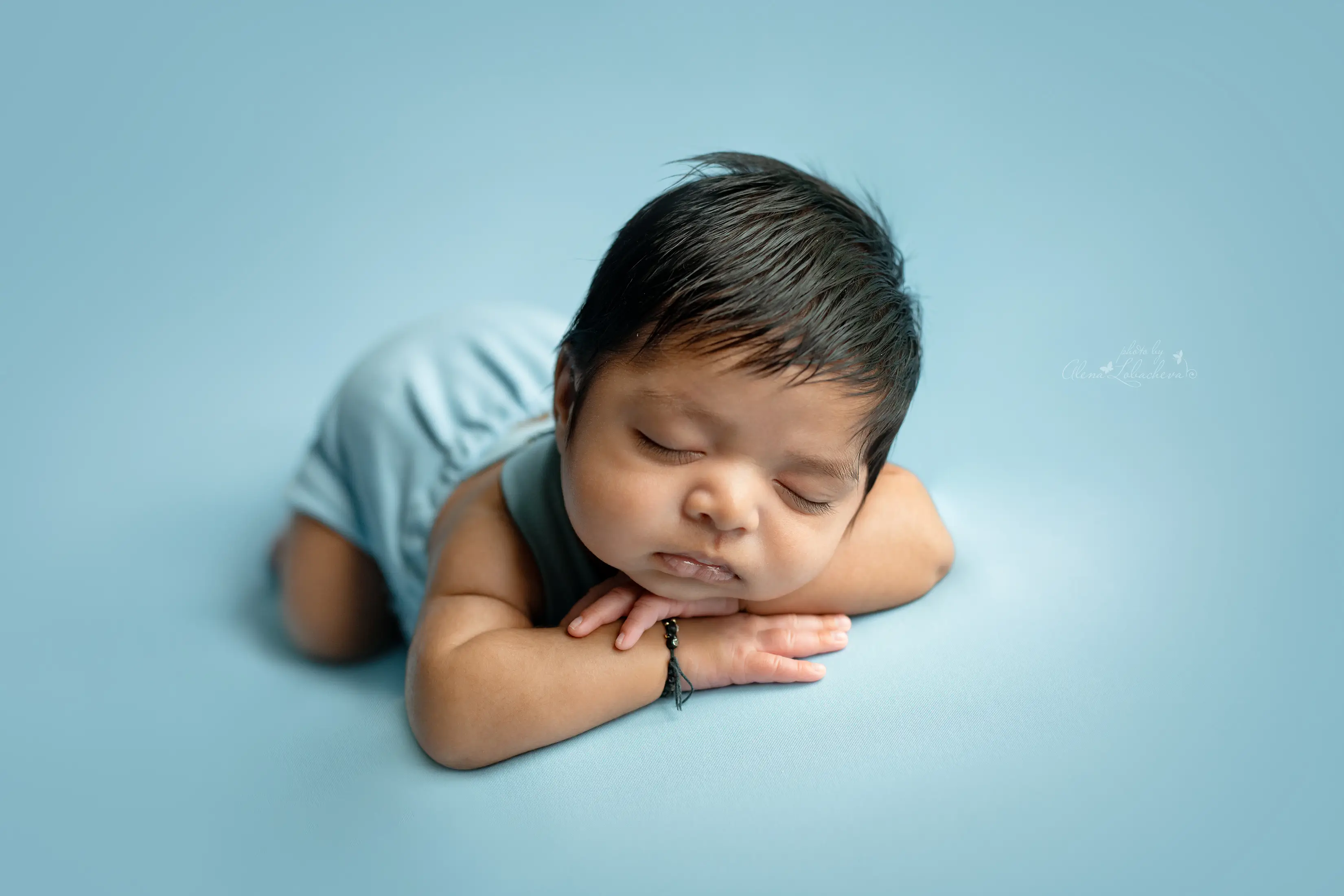 Baby older than one month looking toward the camera